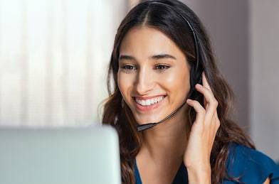 smiling-woman-using-laptop-while-260nw-1387342802